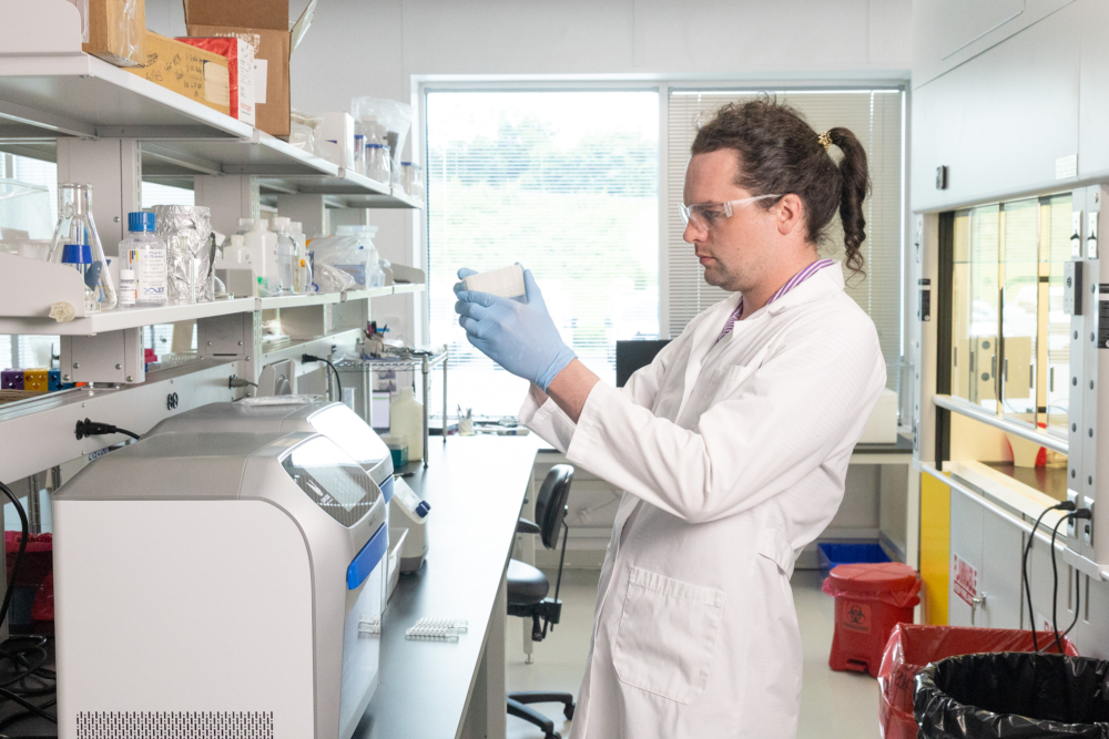 Team member in lab running test