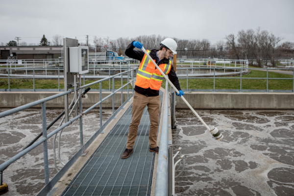 Technician gathering samples
