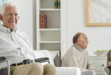 Residents sitting in a senior care facility